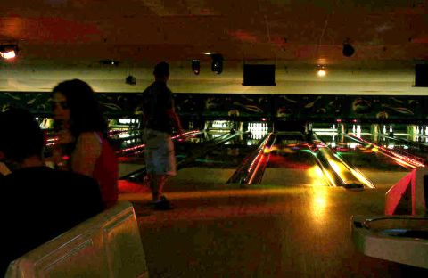 2001 Mercury Grand Marquis - People at a bowling alley during a night event.