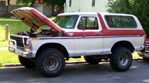 1979 Ford F-250 - This 1978 Ford Bronco has a two-tone paint scheme and appears to be modified for off-road use.