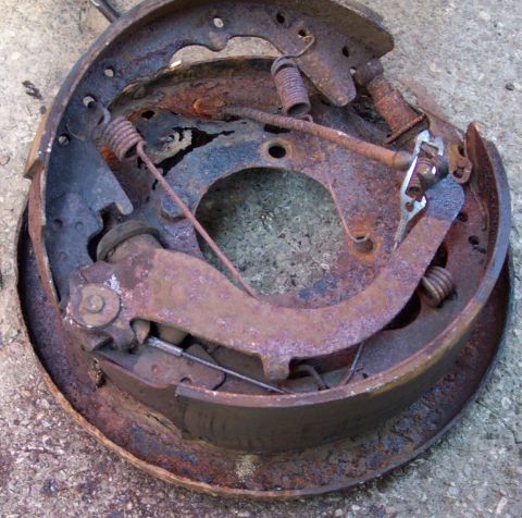 1978 Ford Bronco - This is a rusted brake drum assembly, likely from an older vehicle.