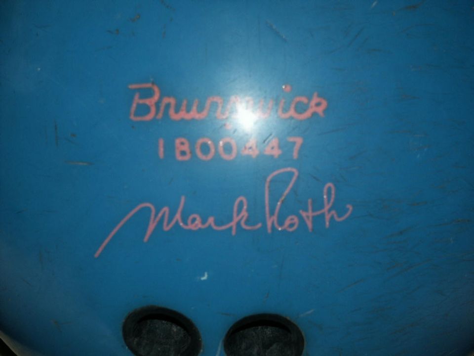 Blue bowling ball with pink writing: Brunswick, 1800447, Mark Roth