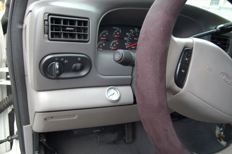2001 Ford Excursion - Dashboard view of a 2001 Ford Excursion, showing the instrument cluster and controls.
