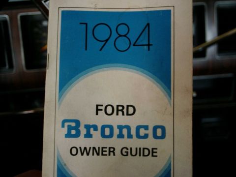 1984 Ford Bronco - A close-up of the 1984 Ford Bronco Owner Guide document.