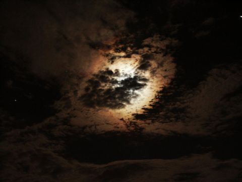 2001 Mercury Grand Marquis - Night sky with moonlit clouds, captured during a cross-country trip.