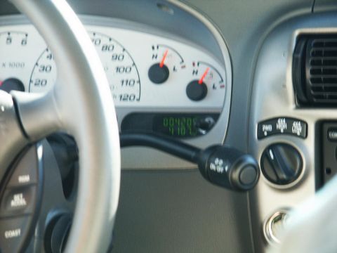 2001 Mercury Grand Marquis - Interior view of a vehicle's dashboard, showing the instrument cluster and gear selector.