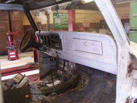 1978 Ford Bronco - The interior of a 1978 Ford Bronco shows the dashboard and steering wheel, indicating it is in the process of restoration.