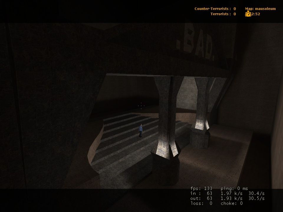 Video game scene showing an interior with pillars and stairs, text overlay indicates game stats
