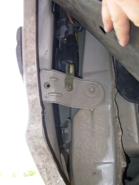 1994 Ford Crown Victoria - Install the motor, pushing it as far UP as possible before tightening the screw, then install the nut on top. The original nut & bezel can…