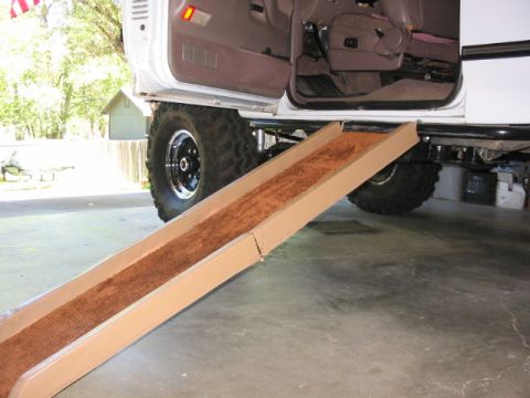 1995 Ford Bronco - Dog ramp attached to the side of a 1995 Ford Bronco.