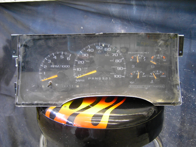 Instrument cluster with tachometer, speedometer, fuel, oil pressure, voltage, and temperature gauges