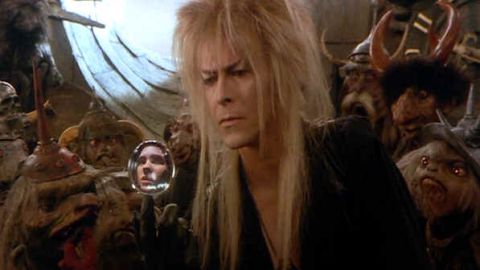 1987 Suzuki Samurai - A scene from a fantasy movie with a man and various creatures.