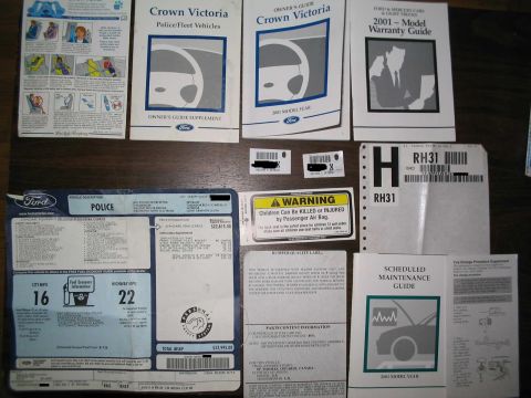 2001 Ford Crown Victoria - All the neat-o stuff I found in the owner's manual case, minus the Turtle Lake PD's insurance cards!