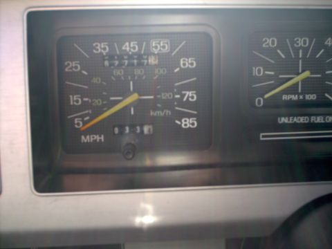 1982 Ford Bronco - The interior of a 1982 Ford Bronco, its dashboard gauges including the speedometer and tachometer.
