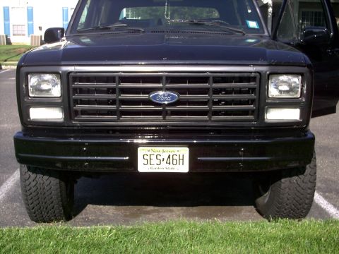 1982 Ford Bronco - Front view of a black 1982 Ford Bronco, displaying its grille and headlights, with a New Jersey license plate.