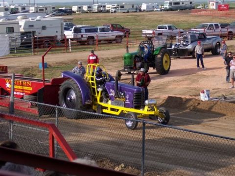 1972 Ford Ranchero - Tractor pull competition with modified tractors and support vehicles.