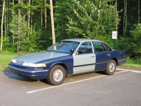 1991 Ford LTD Crown Victoria - This 1991 Ford Crown Victoria LTD sedan features a distinctive two-tone paint scheme of blue and gray.