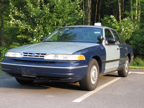 1991 Ford LTD Crown Victoria - This 1991 Ford Crown Victoria is seen from the front three-quarter view, parked outdoors.