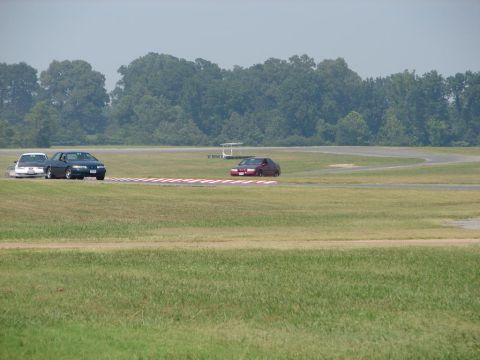 1992 Ford Taurus - Cars on a race track during an event.