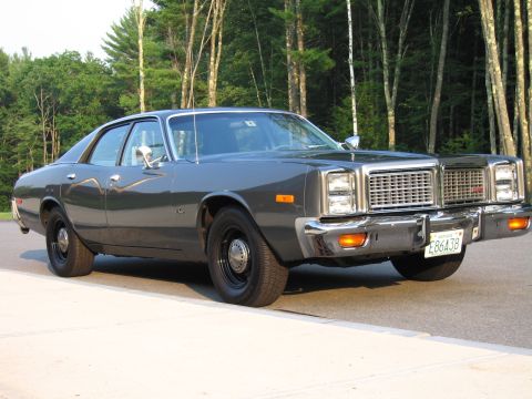 1991 Ford LTD Crown Victoria - This 1977 model sedan features a distinctive chrome grille and bumper, with a visible license plate.