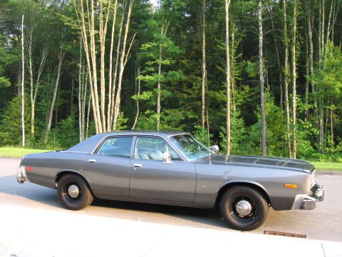 1991 Ford LTD Crown Victoria - This full-size sedan features a classic boxy body style and steel wheels.