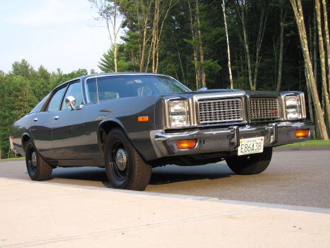 1991 Ford LTD Crown Victoria - This sedan features a distinctive grille and chrome accents, with a license plate visible on the front.