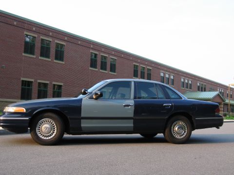 1991 Ford LTD Crown Victoria - This 1991 Ford Crown Victoria has a two-tone paint scheme, with the front half light gray and the rear half dark blue.