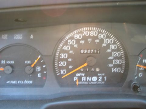 1991 Ford LTD Crown Victoria - Interior view of a car's dashboard, showing various gauges and the odometer reading.