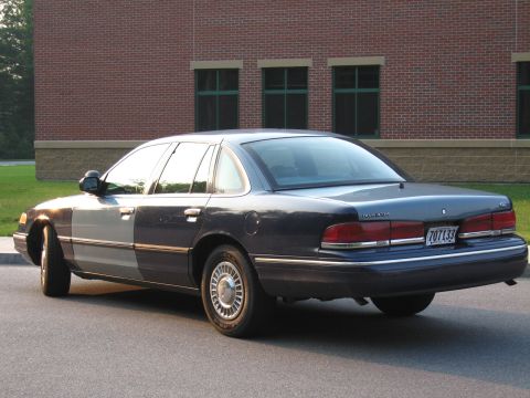 1991 Ford LTD Crown Victoria - This 1991 Ford Crown Victoria LTD is seen from the rear, a distinctive two-tone front fender.