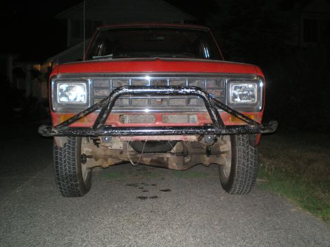 1985 Ford Bronco II - Front view of a red 1985 Ford Bronco II equipped with a custom brush guard.