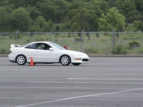 2001 Mercury Grand Marquis - White Acura Integra coupe navigates a course marked by orange cones.