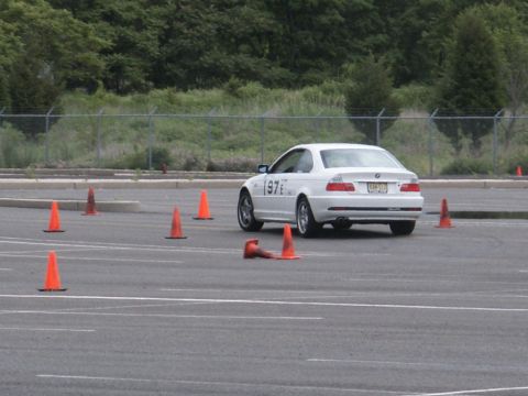 2001 Mercury Grand Marquis - White BMW 3 Series coupe navigates a course marked by orange traffic cones.
