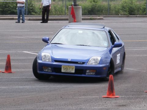 2001 Mercury Grand Marquis - Blue Honda Prelude navigates a course marked by orange cones.