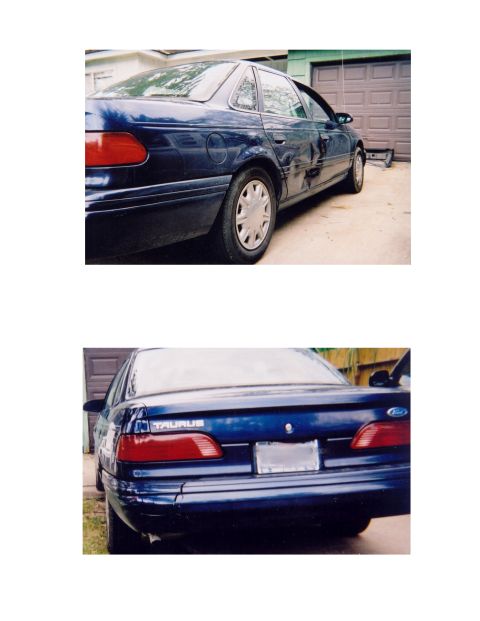 1993 Ford Taurus - This 1993 Ford Taurus has visible damage on the rear bumper and driver's side door.