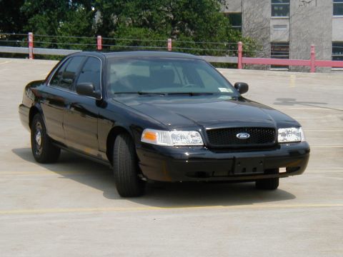 2003 Ford Crown Victoria - Rob's 03 P71. The last thing you'd want to see in your rear view mirror.