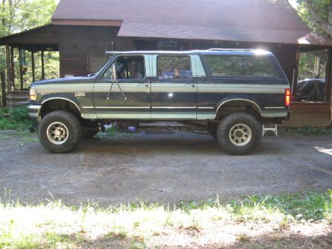 1979 Ford Bronco - This Ford Bronco SUV features a significant lift kit and custom two-tone paint scheme.