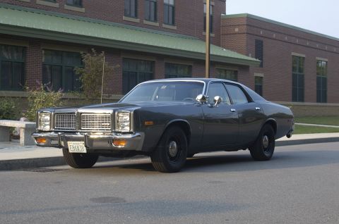 1978 Dodge Monaco - This 1978 Dodge Monaco sedan is captured in a front 3/4 view, its distinctive grille and dark gray paint.