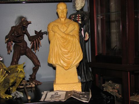 1991 Ford Bronco - A collection of horror-themed action figures and busts are displayed on a shelf.