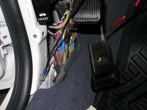 2001 Ford Crown Victoria - I ran a new ground for the driver's side courtesy lamp. This ground is under the driver's side kick panel.