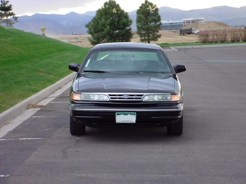1998 Ford Crown Victoria - This 1998 Ford Crown Victoria is shown from the front, its distinctive grille and headlights.