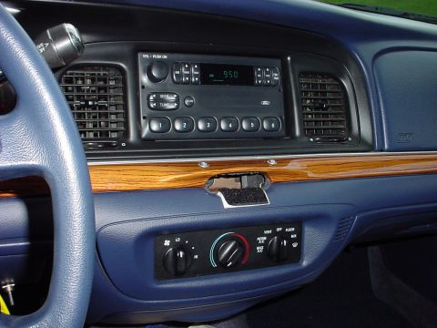 1998 Ford Crown Victoria - This is where the MHP added a few switches that worked with the radar setup they had, they took out the stock clock and used a dremmel type…