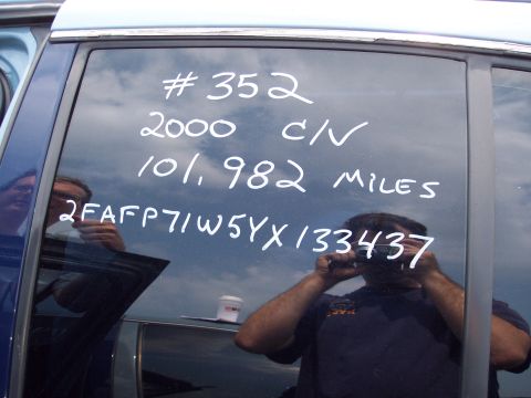 1991 Ford LTD Crown Victoria - Writing on a car window indicates the model year is 2000, contradicting the registry's claim of a 1991 model.