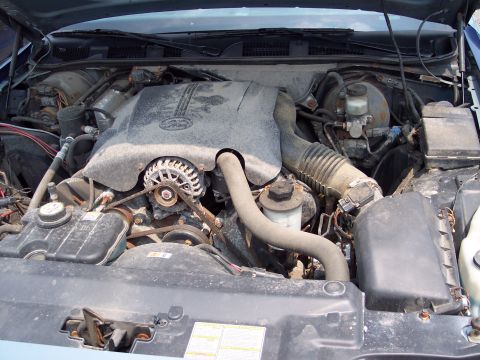 1991 Ford LTD Crown Victoria - Engine bay of a 1991 Ford Crown Victoria showing the V8 engine and associated components.