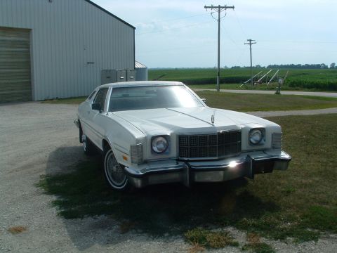 1975 Ford Torino - 1975 Ford Torino parked outdoors near a barn and agricultural field.