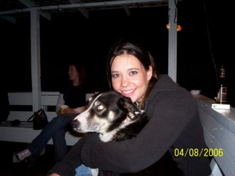 1996 Ford F-150 - A woman smiles while holding a dog, with a timestamp indicating the photo was taken on April 8, 2006.