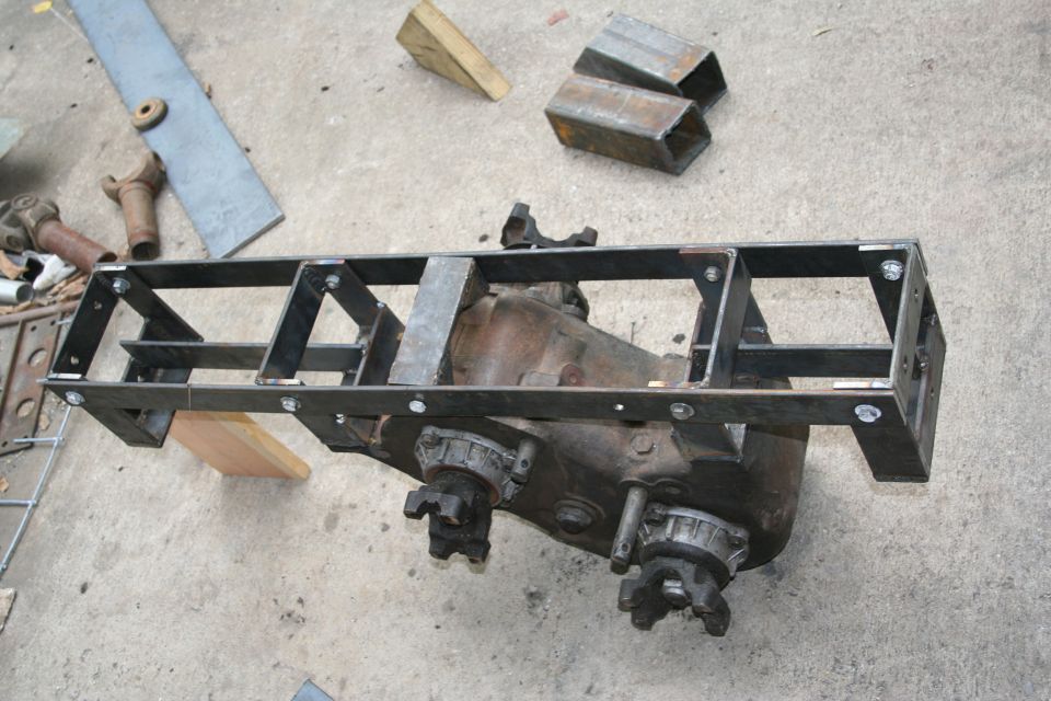 I'm not going to use this, it will hang way too low, and snag on every rock/obstacle. 

The new one is out of DOM tubing that all joins up to two pieces of 2"x2" 0.25 wall tubing that each bolts to the frame via 3 recessed bolts per side. Pics later...