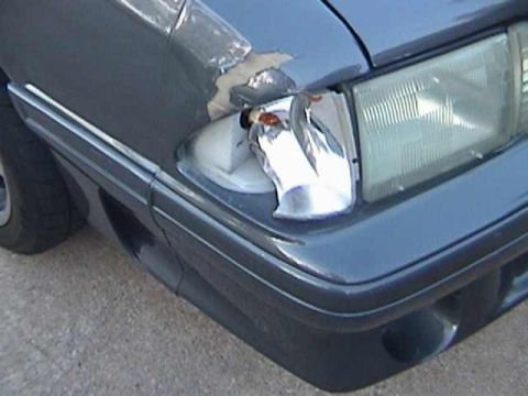 1989 Ford Mustang - The front passenger side headlight assembly is damaged on this 1989 Ford Mustang.