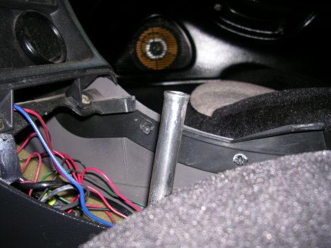 1996 Ford Probe - The interior of a car shows a shifter and a mess of wires, suggesting some modification or repair work.