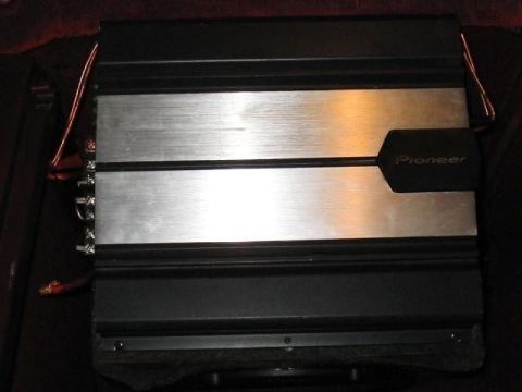 1990 Ford Probe - GM-5100T Pioneer Amplifier - Phoenix Gold 8 Gauge Wiring Kit - Located On Subwoofer Box - Powers Subwoofer - Bridged RMS 380W - Bridged Pea…