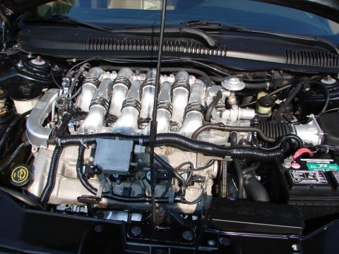 1992 Ford Taurus - Close-up of a Ford SHO V8 engine, likely from a mid-90s model.