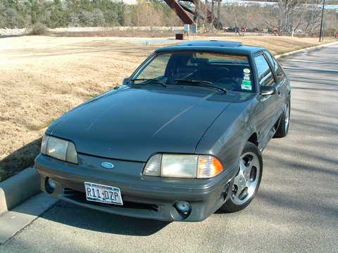 1989 Ford Mustang - This 1989 Ford Mustang is captured in a front 3/4 view, its iconic body style.