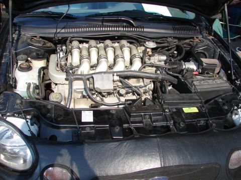1992 Ford Taurus - The 3.4L V8 engine from a 1996 Ford Taurus SHO is visible, with the intake manifold prominently displayed.